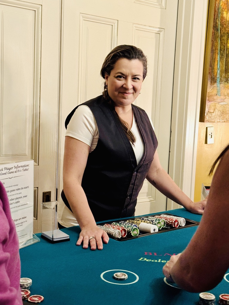 Elan at her blackjack table looking at the camera
