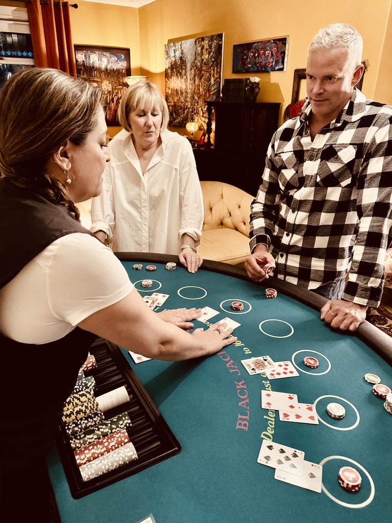two players play at the blackjack table
