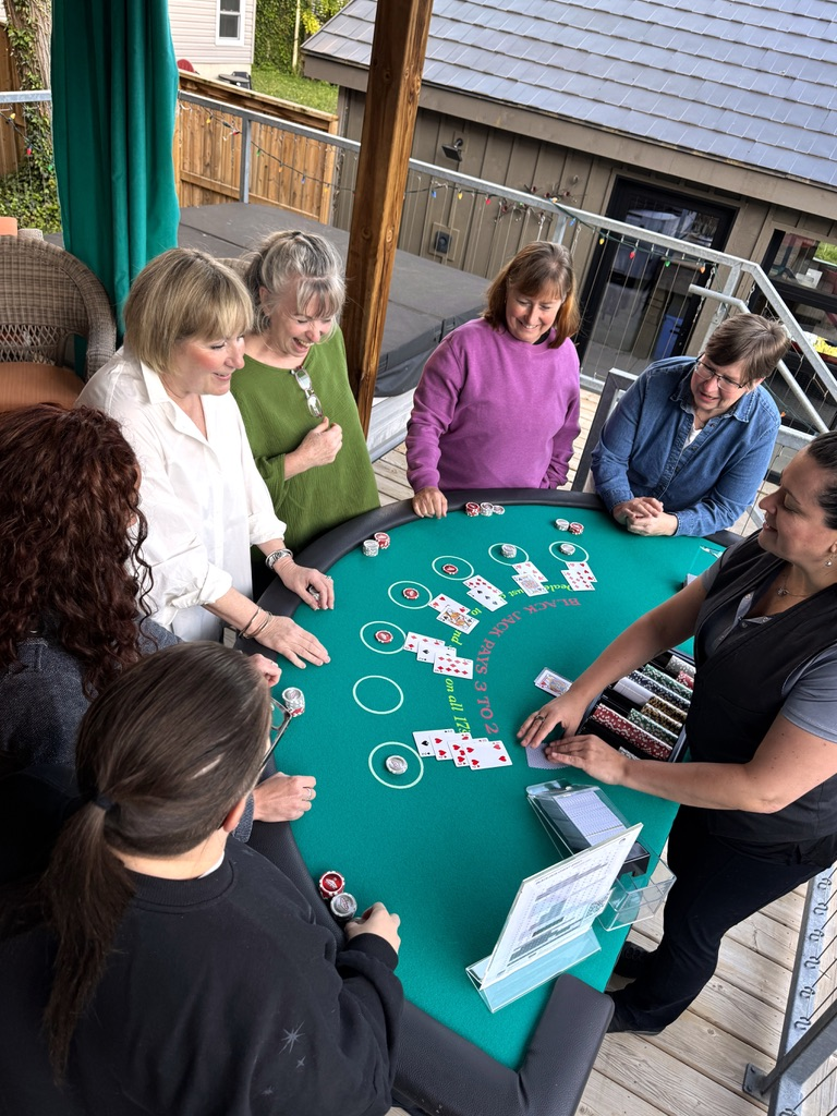 Kim winning a hand at blackjack